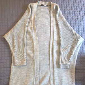 Knee length sweater